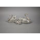 A set of three graduated silver-mounted cut glass 'swan' bon bon dishes,