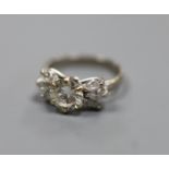 A white metal (stamped 18ct Plat) and single stone diamond ring, with six stone marquise cut