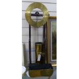 A 17th century style oak and brass 'Clepsydra' or water clock,having engraved chapter ring, water