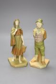 A pair of Royal Worcester blush figures of an Irishman and Irish girl, height 17cm