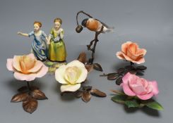 Four Boehm porcelain and bronzed metal roses, a similar model of a bullfinch eating berries and a