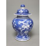 A 19th century Chinese blue and white prunus jar and cover, height, 33cm