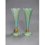 A pair of late 19th century Bohemian cased glass vases, height 21cm