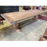 An 18th century style rectangular pine refectory dining table, length 300cm, depth 100cm