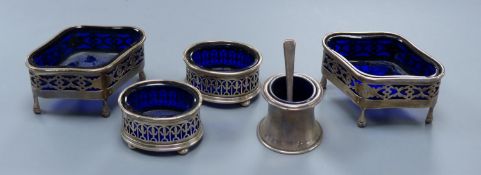 A pair of Edwardian pierced silver quatrefoil shaped salts with blue glass liners, London, 190987mm