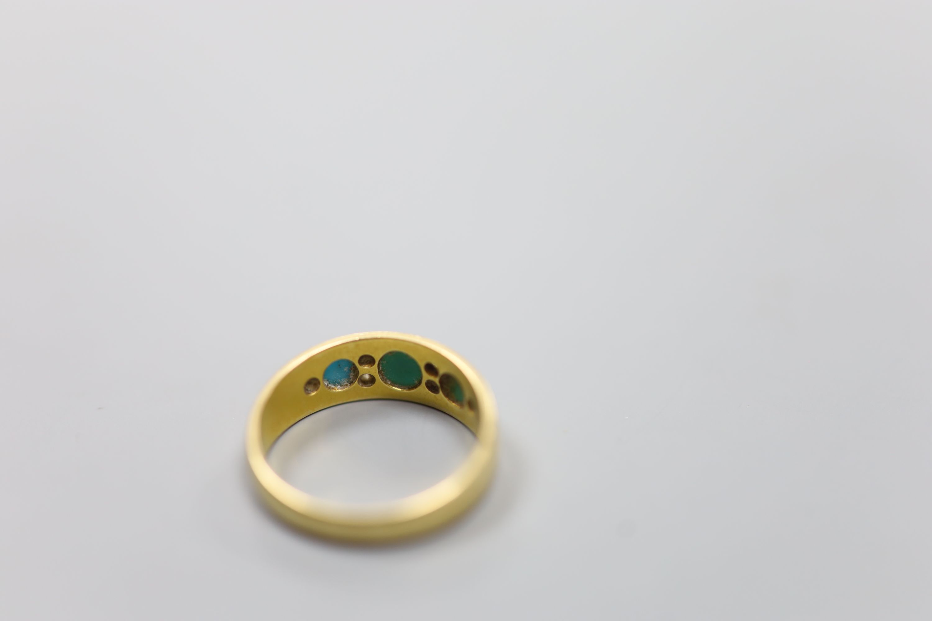 An early 20th century 18ct, three stone turquoise and six stone diamond chip set ring, size M/N, - Image 3 of 3