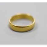 A 22ct gold wedding band, size L,3.7 grams.