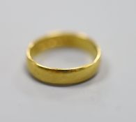 A 22ct gold wedding band, size L,3.7 grams.