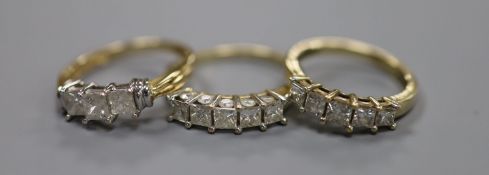 Two modern 9ct gold and five stone diamond set half hoop rings, sizes N & R/S gross 6.4 grams and a