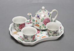 A Chinese Famille Rose miniature tea set with tray, length 18cm