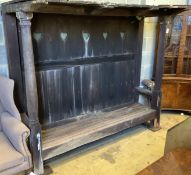 An Arts & Crafts Voysey style oak garden arbour bench seat (in need of some restoration), length