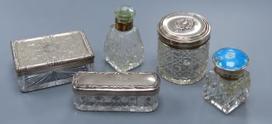 A Victorian silver mounted glass toilet jar, 98mm, four other silver mounted toilet jars, including