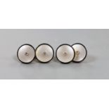 A cased pair of 18ct, mother of pearl, black enamel and diamond set circular cufflinks,diameter