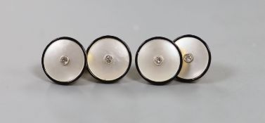 A cased pair of 18ct, mother of pearl, black enamel and diamond set circular cufflinks,diameter