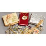 Mixed jewellery including silver bracelet, costume jewellery and a cigarette case.