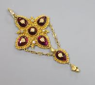 A 19th century yellow metal, foil backed garnet, seed pearl and diamond set drop pendant (adapted),