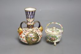 A Royal Crown Derby vase, with two mask head handles painted in Imari style, date code for 1882 and