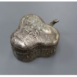 A late Victorian embossed silver clover leaf shaped trinket box, import marks for Chester, 1899,