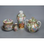 A Chinese famille rose box and cover, two vases, a sugar bowl and cover and a saucer, late 19th/