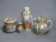 A Chinese famille rose box and cover, two vases, a sugar bowl and cover and a saucer, late 19th/