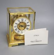 A Jaeger le Coultre Atmos mantel clock, with white enamelled Roman chapter ring, in gilt-brass