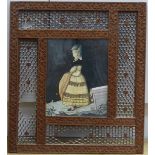 An early 19th century painted silk and gilt metal portraitdepicting a young woman wearing