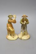 A pair of Royal Worcester figures of Stephen and companion, he with a flute and she with a