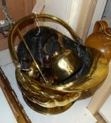 A Victorian helmet shaped coal scuttle and other metalware