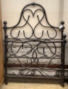 A wrought iron single bed frame, width 117cm