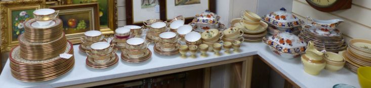 A Mintons breakfast set, a Minton part dinner service and a Woods floral-patterned part dinner