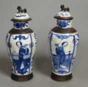 A pair of Chinese blue and white crackle glaze vases and covers, early 20th century, height 22cm