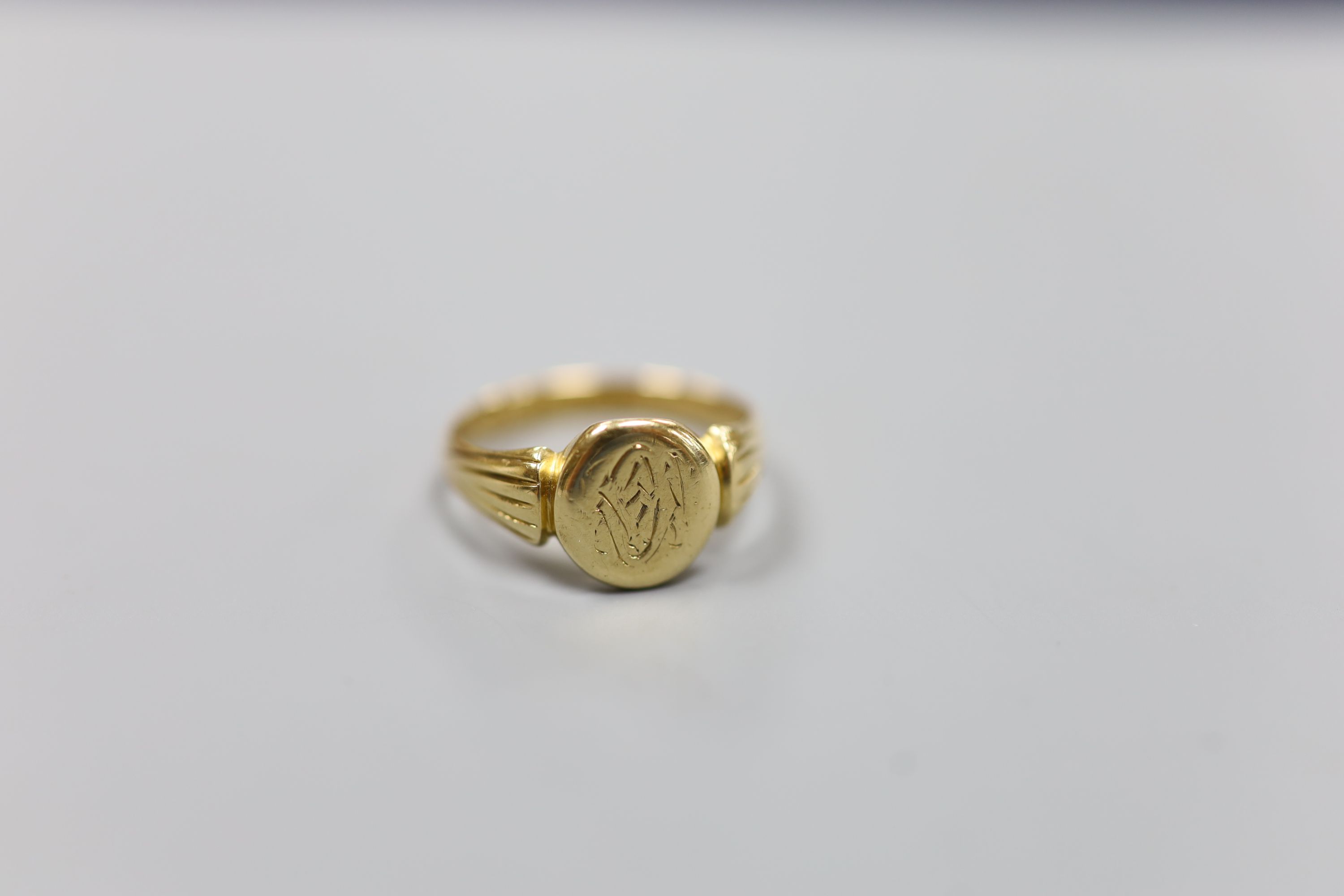 A late Victorian 18ct gold signet ring with engraved crest? (tired), size L/M,4.8 grams. - Image 2 of 3