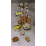 Seven Coalport bone china 'cottage' pastille burners and four similar resin examples (11)