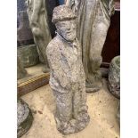 A reconstituted stone garden ornament of a standing figure, height 57cm