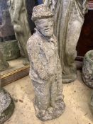 A reconstituted stone garden ornament of a standing figure, height 57cm