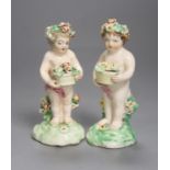 A good pair of Derby figures of children holding baskets of flowers c. 1760, patch marks, firing