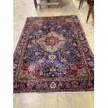 A North West Persian design blue ground carpet, 284 x 196cm