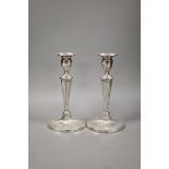 A pair of late Victorian silver oval candlesticks, with engraved inscription, Charles Stuart Harris