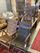 Three various teak folding garden elbow chairs together with two other teak garden chairs