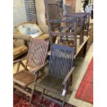 Three various teak folding garden elbow chairs together with two other teak garden chairs