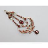 A late Victorian gold plated and facet garnet garnet cluster set drop pendant, overall 75cm, 6.9