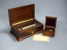 A Swiss Reuge St Croix marquetry and walnut cylinder music box, playing 'The Four Seasons' and a