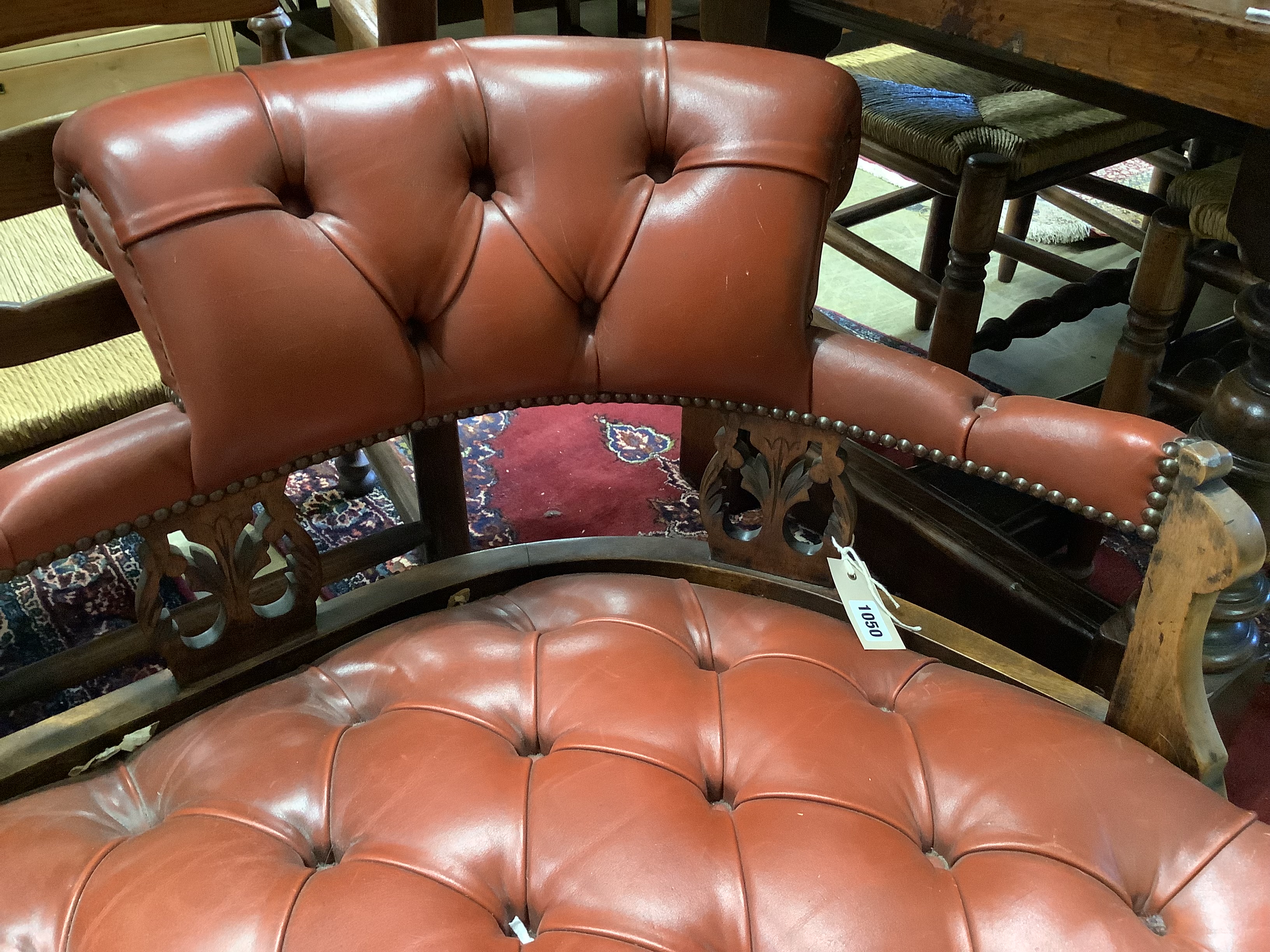 An Edwardian beech two-seater couch upholstered in buttoned burgundy hide on scrolled legs, length - Image 3 of 3