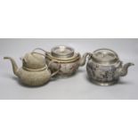 A trio of Chinese pewter mounted Yixing teapots