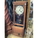 An early 20th century oak cased clocking in clock, height 116cm