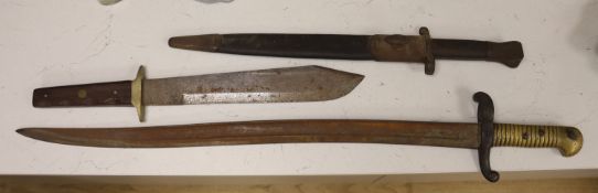 A 19th century French bayonet, together with an early 20th century English bayonet and a ‘Remember