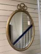 A gilt and composite wall mirror with simulated rope twist frame, width 56cm, height 84cm,