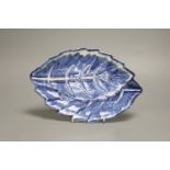 A rare Bow dish, moulded as two overlapping leaves, c.1762, four character mark, length 29cm