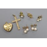 A 9ct gold cross pendant, three pairs of 9ct ear studs, one odd ear stud and a 9ct gold heart