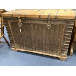 An Indonesian iron bound hardwood trunk, length 122cm, depth 54cm, height 86cm